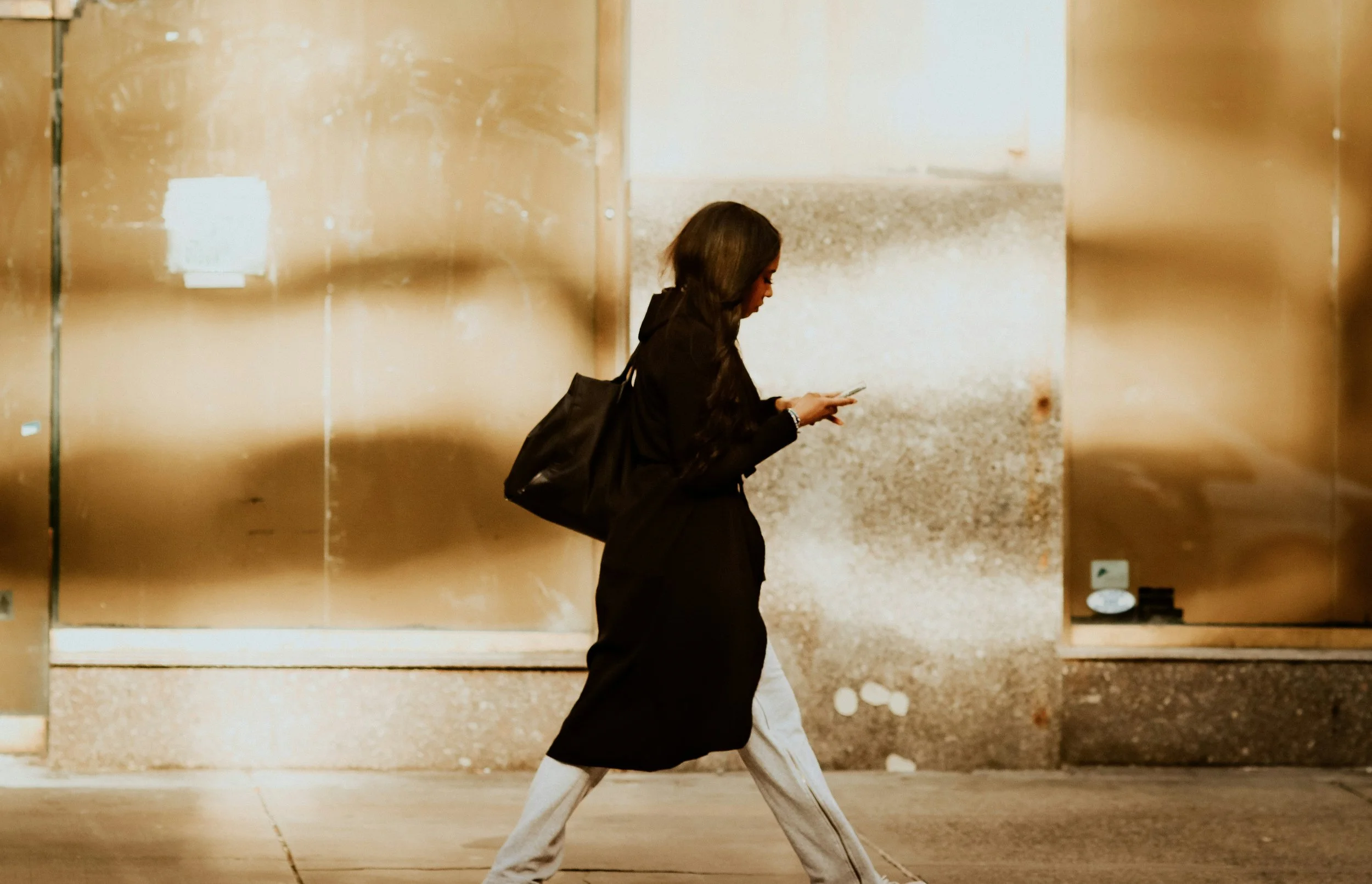A woman moving through her workday